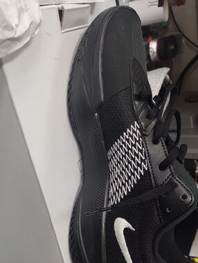 Nike Men’s Black Athletic Sneakers with White Swoosh and Knit Detail